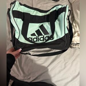 Adidas teal duffel/sports bag.